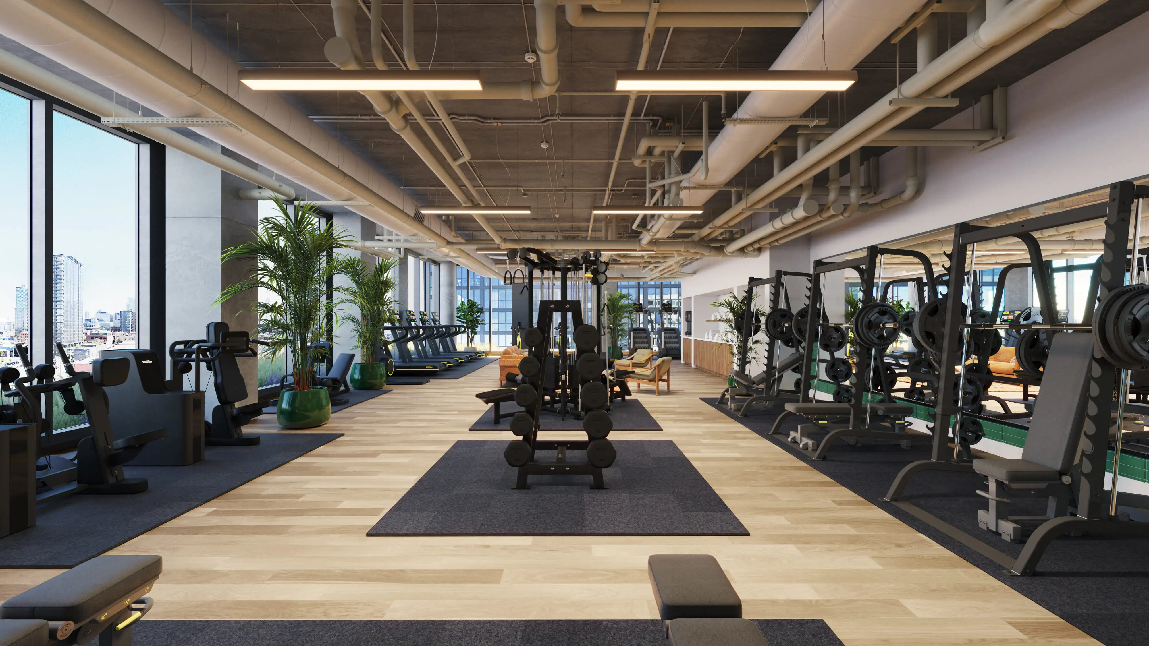 Fitness center at Stead 220 with strength equipment, mirrors, and open workout space